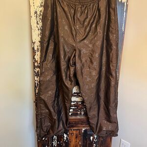 Vintage Komitor Women’s nylon ankle zip metallic track pants. Size 18/20